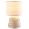 Illuminate your space with the timeless elegance of the Niva Table Lamp. 