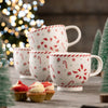 Belleek Living Peppermint Party 4 Footed Mugs filled with hot chocolate at Christmas
