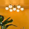 Bombazine 7 Light Semi-Flush Natural Brass life style picture