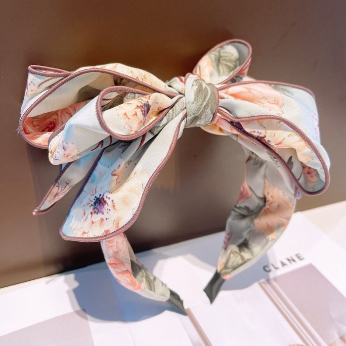 Oversized Bow Headband with Floral Print in Pastel Green