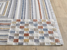 Broadway Geometric Rug 4950A Natural picture of the corner and fringed end