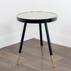 "Circular nest of tables with sleek iron frames"
