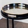 "Contemporary black and gold circular nesting tables"
