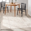 Calvin Klein Irradiant Rug IRR04 Silver Grey lifestyle picture n the dining room