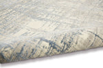 Calvin Klein Rush Rug CK950 Ivory Blue with a combo low-high cut pile