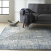Calvin Klein Rush Rug CK950 Ivory Blue lifestyle picture in the living room