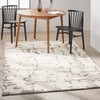 Calvin Klein Sculptural Rug SCL01 Grey lifestyle picture in the dining room