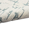 Calvin Klein Sculptural Rug SCL01 Teal hand tufted rug with a cut and loop pile