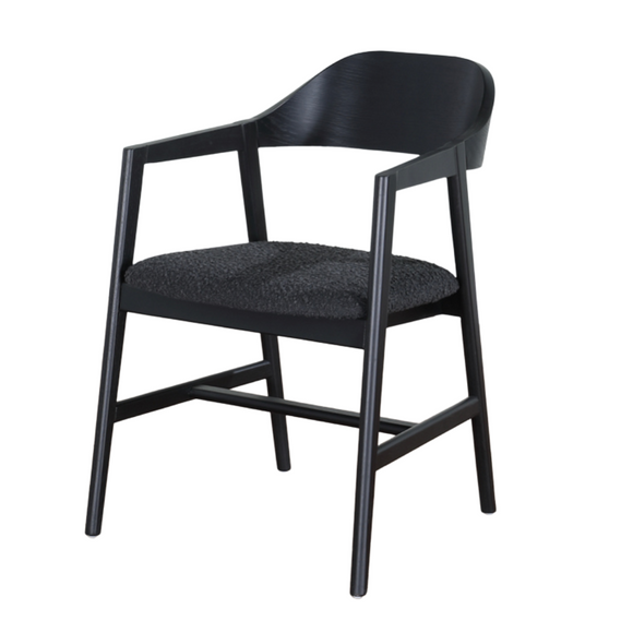 Enhance your dining experience with the Carrington Black Carver Chair – a perfect blend of modern style and comfort.