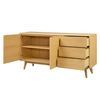 Elevate your living space with the sleek design of an oak sideboard.