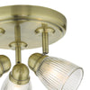Adjustable spotlight bathroom lighting in classic brass finish


