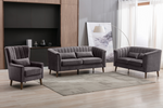 Charlotte Armchair Graphite life style photo with 2-seater and 3-seater sofa