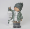 Elevate your holiday decor with an assortment of Green Girl and Boy figurines, each accompanied by a bear and lantern. Add a touch of festive charm and nostalgia to your space with these delightful and heartwarming holiday decorations.