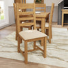 Elegant Seating: Fabric Dining Chair with Ladder Detail.