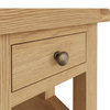 Modern design meets functionality in this wooden side table.
