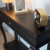 Functional black console table with storage drawer