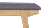 Versatile dining room bench for various settings.