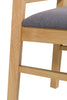 Timeless design fabric dining chair in oak hue.