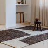 Brink & Campman Craft Fundament Abstract Rug Chocolate Cream lifestyle picture in the living room
