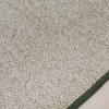 Brink & Campman Craft Matter Plain Rug Ash Grey with a green bordered ends