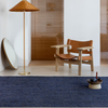 Brink & Campman Craft Plait Plain Rug Denim lifestyle picture in the living room