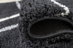 Cruz Bohemian Rug Black 01 close view picture of the border and pile height