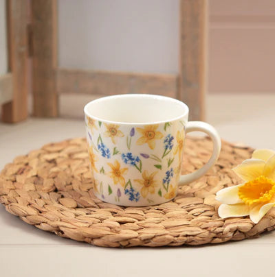 Floral ceramic mug with daffodil and hyacinth design