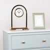 Daniel and Ashley Glass Mantel Clock Gold 29 cm front view life style picture on the chest of drawers