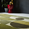 Brink & Campman Decor Cosmo Geometric Rug Greens close-up view picture of the clolor palette