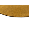 Brink & Campman Decor Echo Plain Rug Ochre Round in a mustard color hue