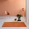 Brink & Campman Decor Rhythm Bohemian Rug Tangerine lifestyle picture in the living room
