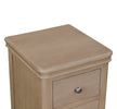 Dursey narrow natural bedside table shown from the side (7)