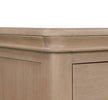 Dursey narrow natural bedside table shown from the side (8)