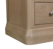 Dursey narrow natural bedside table shown from the side (10)
