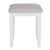 Elegant and practical, the white dressing seat complements any decor.