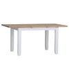 Adaptable elegance: a practical white dining table.
