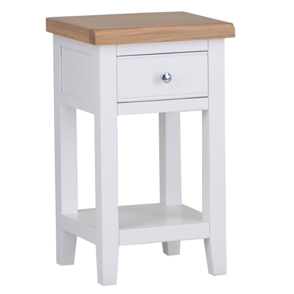 Compact white lamp table for cozy corners.