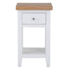 Chic white lamp table for stylish living spaces.