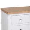 Chic and efficient: enhance storage with a white chest of drawers.