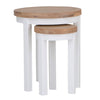 Chic round nesting tables in crisp white.