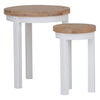 Versatile round nesting tables in bright white.