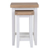 Compact square nest of tables in elegant white.