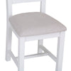 Elegant white dining chair with ladder-back styling.