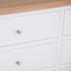 Effortlessly elegant: a white wide chest of drawers for your home.