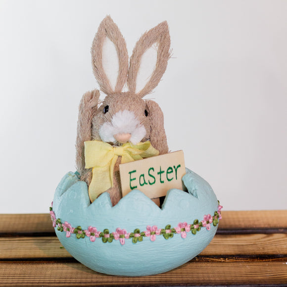 Adorable Easter bunny baby in egg ornament for festive decor

