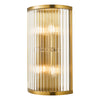 Eleanor 4 Light Wall Light Natural Brass picture with switched on light