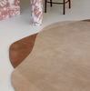 Brink & Campman Element Moore Abstract Rug Caramel lifestyyle picture in the dining room