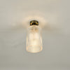 Emerson Semi Flush Antique Brass Cylinder Ribbed Glass close view picture on the ceiling