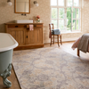 Laura Ashley Endale Floral Rug Soft Truffle lifestyle picture in the bedroom