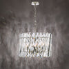 Stunning faceted crystal and polished nickel design

